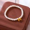 Venta al por mayor: Pulsera de perlas con lazo de princesa Escape, estilo Chanel, sencilla y combinable, accesorios para niñas.