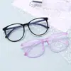 Gafas planas de moda anti luz azul con montura redonda, casuales y lindas, realzan el rostro, versátiles para fotografía callejera y uso casual