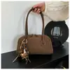 Bolsa de mão de luxo 2026 nova bolsa de ombro vintage para mulheres, bolsa versátil de axila, bolsa de design de nicho da moda para o dia a dia