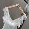 Chal de satén con botones, de corte ajustado, estilo Ins para mujer, sin mangas, con escote en V sexy, retazos de encaje, para Primavera/Verano 2026, transfronterizo