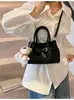 Bolsa de mão de verão estilo coreano para mulheres, novo modelo 2026, bolsa cesta simples, bolsa transversal de grande capacidade