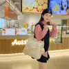 Ina mochila multifuncional estilo fresco y académico estudiante escuela clase tutoría bolso de mano chica bolso de un solo hombro cruzado