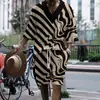 2024 Nuevo Traje Casual Europeo y Americano de Moda en Amazon con Estampado, Oversize, de Punto, Manga Corta y Shorts para Hombre