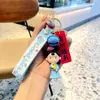 Exame de admissão ao ensino médio cartoon inspirador de reabastecimento Lista Dourada número um boneca chaveiro estudante formatura número um mochila pingente presente