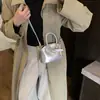 Bolsos de Moda Europeos y Americanos Transfronterizos para Mujer, Bolsos de Mano Brillantes de Nicho, Mini Bolsos Cruzados Nuevos de Primavera de Charol para Niños