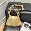 Bolso Pequeño Calado de Primavera y Verano de Nicho Transfronterizo para Mujer 2026 Nuevo Estilo Coreano Bolso de Hombro Cruzado de Moda Bolso Tejido con Cordón