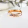 Anillo de concha de tres diamantes simple de moda tendencia ins viento frío anillo para amantes de la comida no se decolora venta al por mayor de fabricantes