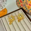 Pendientes Dorados en Forma de Fuegos Artificiales de Nuevo Estilo Europeo y Americano Lugong para Mujer, Pendientes y Aretes de Estilo Metálico Exagerado con Aguja de Plata