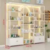 Expositor de arco para tienda de belleza y cuidado de la piel de influencers, estante cosmético de pie de gran tamaño, expositor de muestras de arte de hierro de lujo ligero