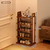 Un zapatero pequeño y estrecho para entradas, un estante de almacenamiento de varias capas para el hogar, un organizador de zapatos de bambú simple y que ahorra espacio