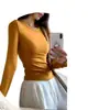 Camiseta de manga larga de color liso estilo americano para mujer, hecha de algodón puro, camisa básica de otoño de corte ajustado con un diseño elegante