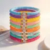 Pulsera de Cara Sonriente con Esmalte de Goteo de Venta Caliente Transfronteriza Europea y Americana Conjunto de Pulseras Apilables de Cerámica Suave Colorida Estilo Bohemio de Verano