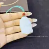 Colgante de collar con cabeza de Buda de jade natural del Tianshan Colgante de jade de Guanyin Venta al por mayor Artículo popular de transmisión en vivo Venta directa de fábrica