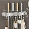 Estante de clip para colgar mopa en la pared, gancho sin perforaciones, baño, hebilla de baño, artefacto fijo para escoba, estante de almacenamiento de mopa