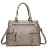 Bolsa de Gran Capacidad de Venta Caliente Transfronteriza Modelo Nuevo 2026 Bolso de Hombro Versátil para Mujeres de Mediana Edad Bolso de Mano de Moda Bolso Tote