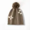 Gorro de punto nuevo estilo coreano para otoño e invierno, gorro holgado de lana reciclada, gorro de punto RPET con protección para las orejas, dropshipping transfronterizo