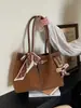 Bolso Grande de Estilo Coreano para Mujer 2025 Nuevo Modelo Textura de Alta Calidad Diseño de Nicho Coreano Bolso de Hombro Bolso Tote para Viajar