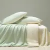 Colcha de verano fresca estilo Muji clase A de seda helada lavada con agua juego de cuatro piezas para dormitorio colcha de verano lavable a máquina colcha de aire acondicionado regalo colcha fina