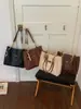 Bolso de mano grande cruzado estilo coreano vintage casual para el trabajo y los desplazamientos, nuevo bolso de hombro tipo tote tejido 2026