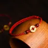 Pulseira de Moedas Antigas de Cinco Imperadores Cor Dourada Qianlong Tongbao para Mulheres, Auspiciosa para Riqueza em Seu Ano do Zodíaco, Pulseira de Fio Vermelho Trançado com Cinábrio