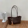 Bolsa Tote Grande Capacidade Estilo Retrô para Mulheres 2026 Nova Simples Versátil Moda para o Trabalho Bolsa de Mão Bolsa de Ombro Único