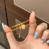 Cuentas de Transferencia del Año Zodiacal Cuerda Roja Trenzada de Múltiples Hilos Lujo Accesible para Mujer Diseño de Nicho Moda de Gama Alta Elegante Pulsera Sencilla