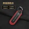 Llavero de Coche BMW Mercedes-Benz Audi Fibra de Carbono Real Logo Metálico Colgante Decorativo para Llaves Llavero para Hombres y Mujeres