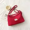 Bolso de lona casual de nicho, bolso de hombro de nailon, bolso cruzado deportivo, bolso de retazos versátil y elegante para el día a día