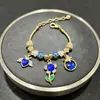 Pulsera Pan Jia Venta Caliente Transfronteriza Pulsera DIY Corona de Pedrería Azul Alas Corazón Flor Mariposa Joyería de Moda