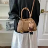 Moderna e simples para o dia a dia, nova bolsa de ombro feminina de luxo leve vintage 2026, versátil para o outono, transversal e bolsa de mão