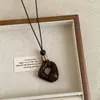 Collar Colgante Redondo Hueco de Resina Estilo Étnico Retro Cadena para Suéter Lujo Accesible Joyería Versátil de Gama Alta para Mujeres
