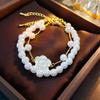 Conjunto de 2 peças de pulseira de pérola sintética de camélia doce que pinga óleo, banho de ouro real, temperamento de alta qualidade, ornamentos de mão ajustáveis para mulheres