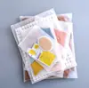 Bolsas con Cierre de Ropa de PE en Stock, Bolsas de Empaque Escarchadas con Agujeros Transpirables para Calcetines de Toalla, Sujetadores, Bolsas de Plástico Auto-Sellantes para Ropa