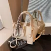 Bolso tipo cubo minimalista transfronterizo para mujer, elegante y moderno, bolso de hombro y cruzado de alto valor, primavera 2026, vintage