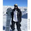 Novo Conjunto de Ski de Veludo Solto de Inverno 2025 para Homens e Mulheres, Conjunto de Duas Peças com Capuz para Esportes de Montanhismo ao Ar Livre