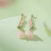 2026 Nuevo Estilo Caliente Flor de Lirio Aretes de Borla de Flor para Niña Cara Redonda Aretes Largos Ear Cuff Elegante