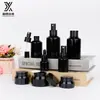 Botella de aceite esencial negro Spot 120ml set de botellas cosméticas botella de aceite esencial botella de crema botella de loción botella de vidrio de hombro inclinado