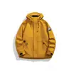 Chaqueta funcional con capucha para exteriores, unisex, diseño moderno color-block, a prueba de viento e impermeable, prenda exterior elegante y versátil