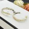 Novedad 2025 Estilo Chanel Moda Elegantes Lisos Aretes Dobles C para Mujer con Agujas de Plata, Réplica de Lujo de Gama Alta con Etiqueta Aros para Oreja