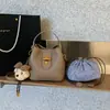 Bolsa de Hombro para Mujer Estilo Nuevo Primavera 2026 Bolso Cruzado Versátil Bolso Cubo Versátil Bolso Cruzado de Moda