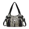 Bolso de hombro estilo motocicleta con estampado de leopardo transfronterizo, bolso tote estampado retro de gran capacidad para mujer, bolso cruzado de moda para exportación, personalizable
