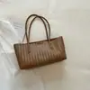 Bolso de Axila para Mujer de Gran Capacidad 2026 Verano Nuevo Bolso Tote con Textura Tejida Color Sólido Moderno Sencillo Bolso de Hombro