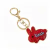Nuevo Llavero de Conejo Incrustado de Diamantes Colgante DIY Regalo Pequeño Llavero Versátil para Coche Accesorios de Dopamina