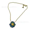 Estilo Occidental Chapado en Cobre Antiguo con Oro de 18K, Color Dorado Vintage con Esmalte Azul, Presentando un Diseño Circular de Piedra Natural en el Centro