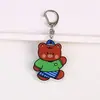 Llavero de Oso de Mantequilla Lindo de Dibujos Animados Acrílico de Aspecto Elevado Colgante de Pareja para Mochila Escolar Llavero para Mejor Amigo