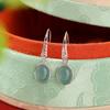 Pendientes Yuebao de plata de ley S925 con diseño retro de jade azul y cara de huevo hueca, elegantes y combinables con todo.