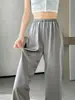 Foto real de los nuevos pantalones acampanados de satén y seda helada para el verano de 2026, pantalones casuales de pierna ancha de acetato de cintura alta, pantalones largos para mujer