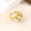 Huajie Europeu e Americano Exportação Recorte Completo Diamante Trevo Elegante Romântico Aberto Anel de Cobre Joias Femininas Venda por Atacado ao Vivo
