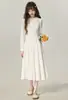 Vestido largo de manga larga con cuello polo de botones blancos estilo universitario para mujer, primavera y otoño, temperamento elegante, entallado a la cintura, suave, falda larga de forma de paraguas