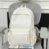 Mochila estudiante universitaria femenina versión coreana ins gran capacidad simple color sólido mochila para estudiantes de secundaria y preparatoria para niños y niñas